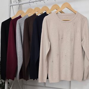 Sweter de Lanilla Suave con Tachitas en la Parte Delantera.